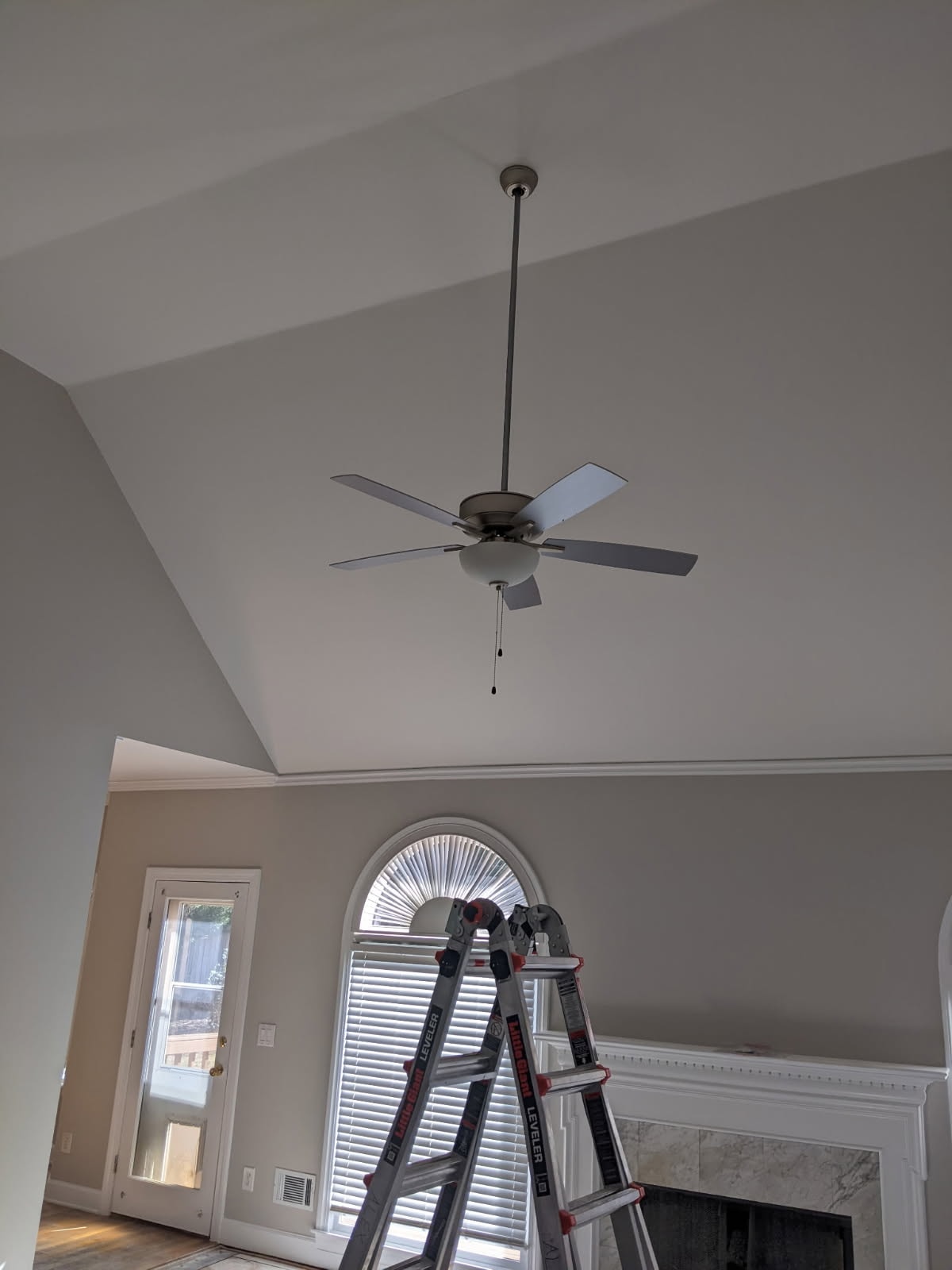 Interior painting – vaulted ceiling with fresh paint and ceiling fan installation