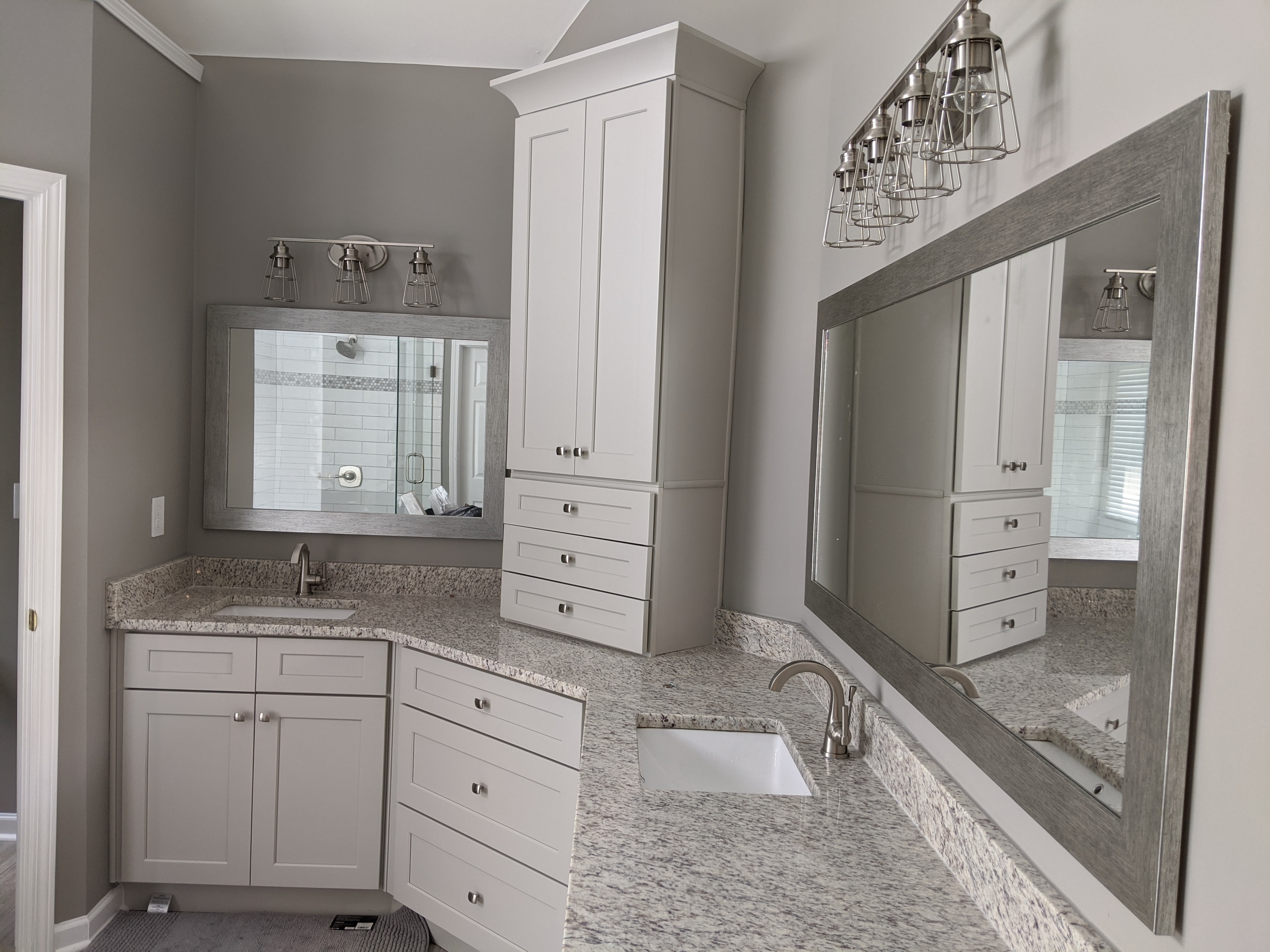 Leake master bathroom renovation – dual vanity with granite countertops